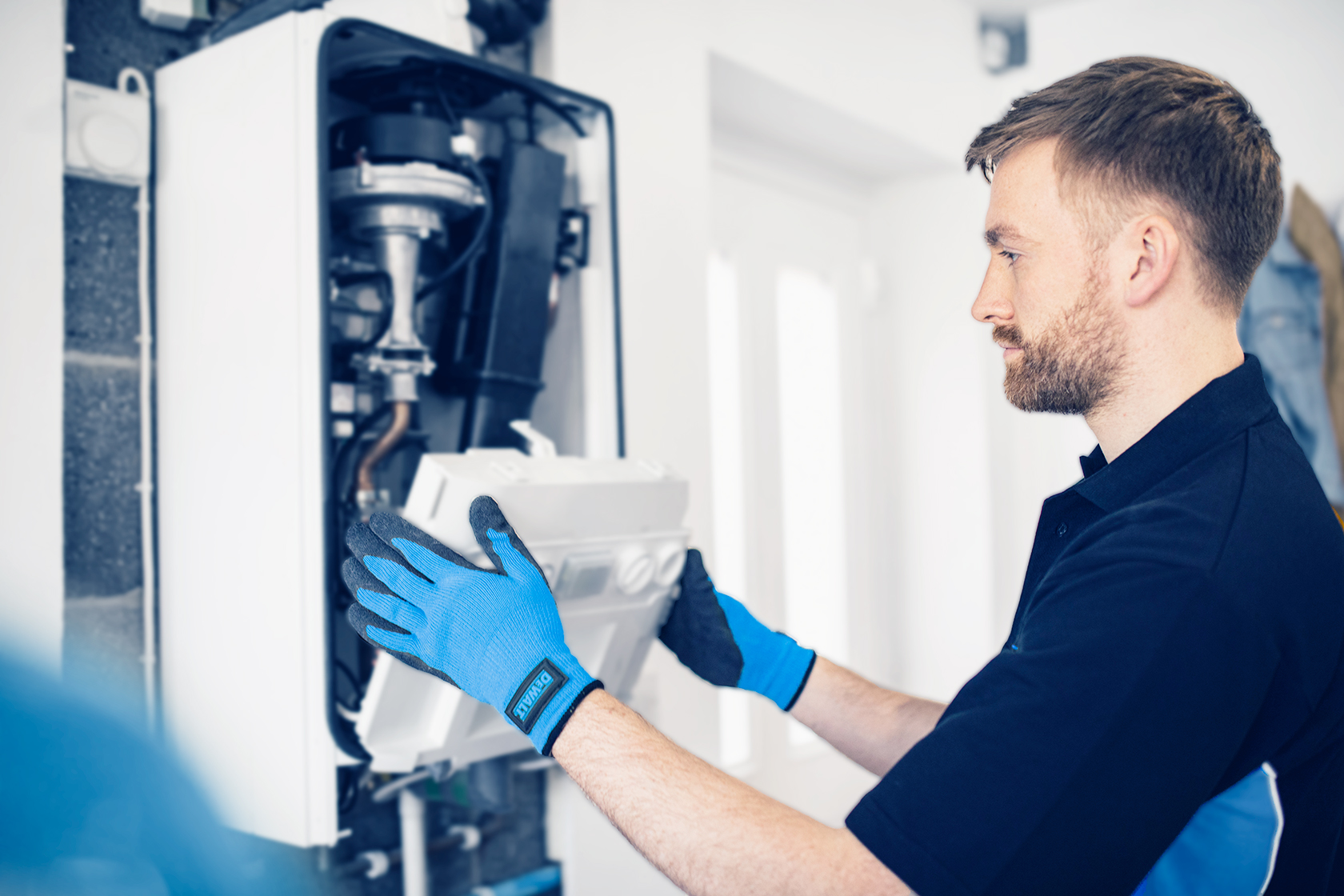 home_engineer_repairing_boiler_PG2128-2_small boiler repair durham carried out by 0800 Repair